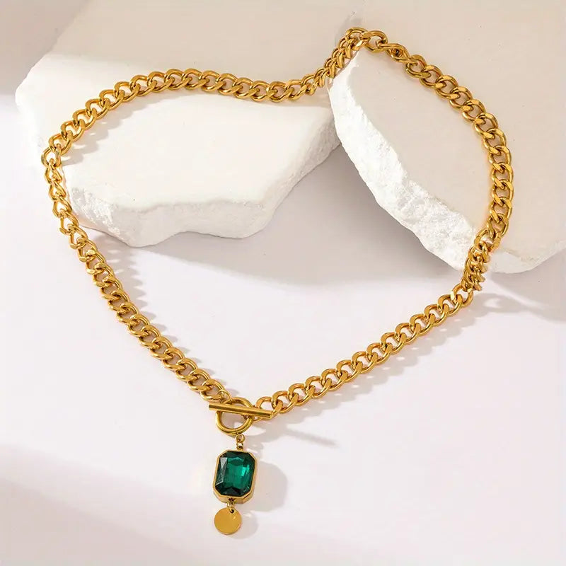 Elegante gouden ketting met smaragd hanger