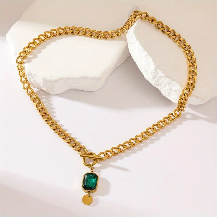Elegante gouden ketting met smaragd hanger