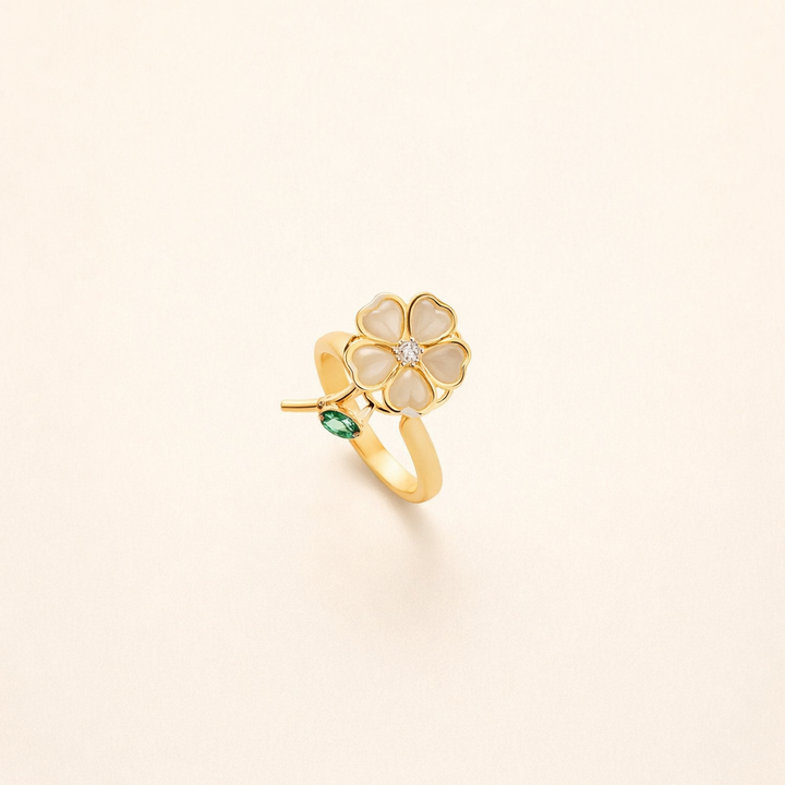 Elegante gouden ring met draaiende bladeren