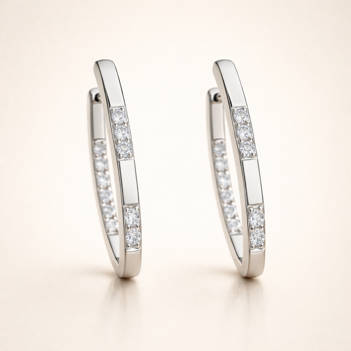 Elegante oorbellen van wit goud met sprankelende zirkonia