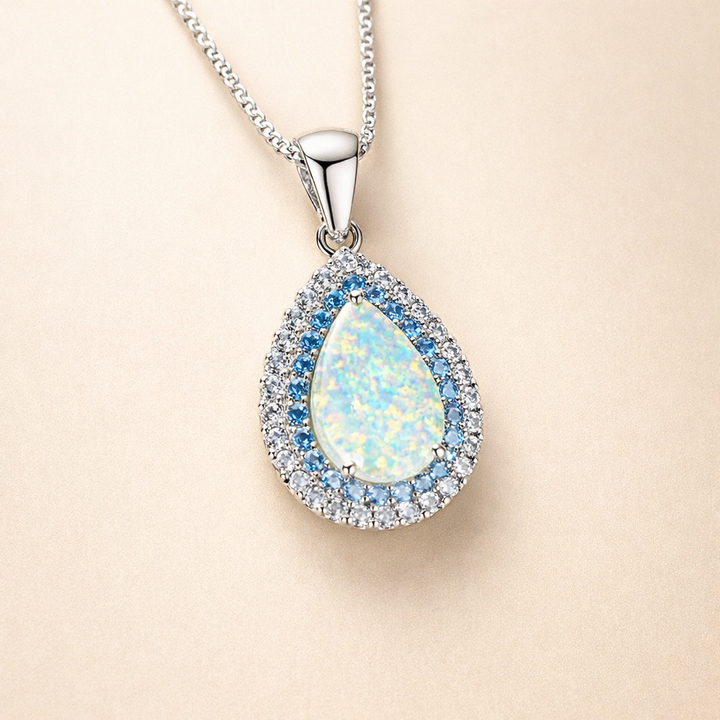 Sprankelende blauwe opal ketting in wit goud