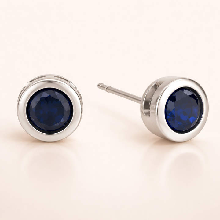 Elegante oorbellen van wit goud met saffier zetting