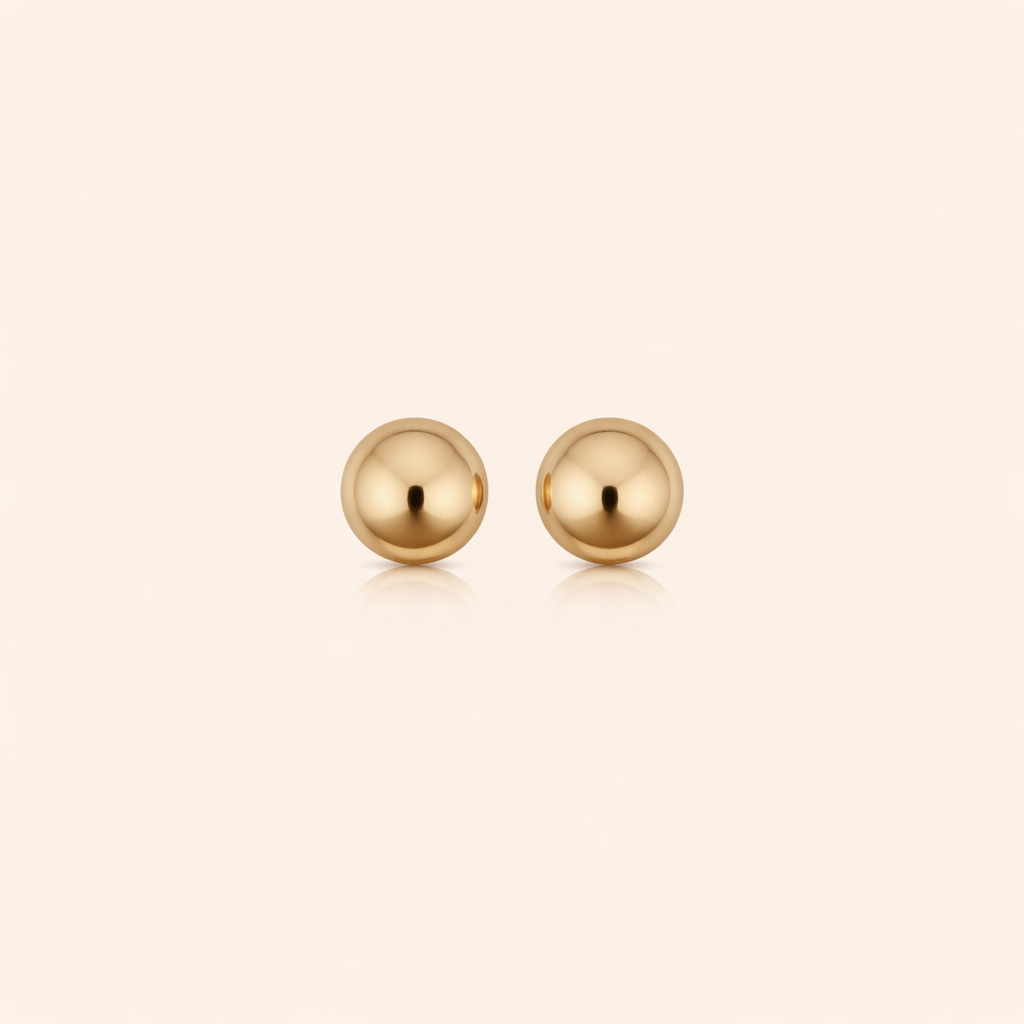 Elegante witte gouden oorbellen met subtiele balvorm
