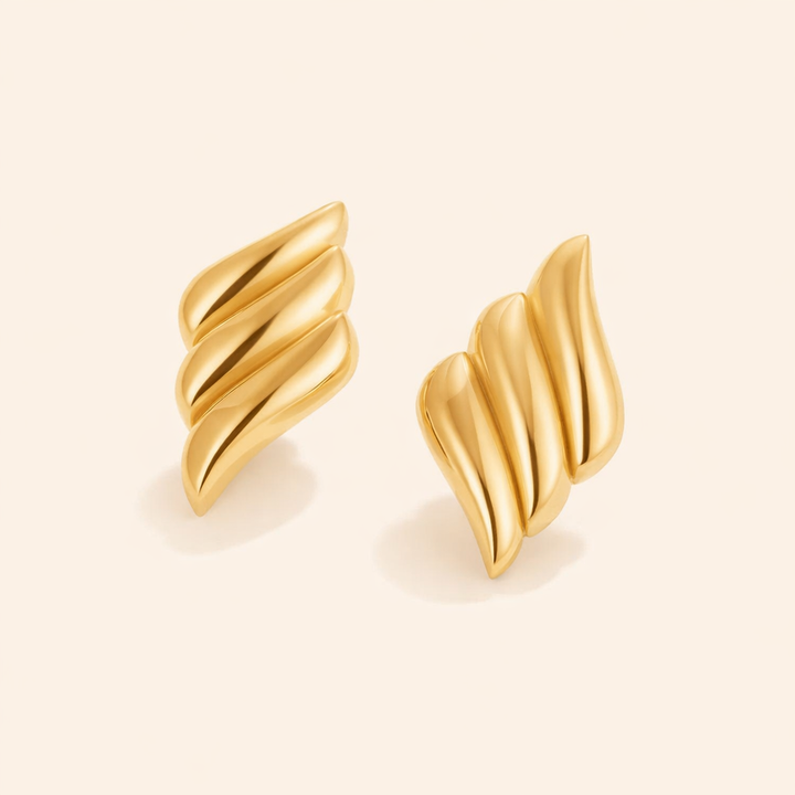 Elegante gouden oorbellen met verfijnde ronde vormen