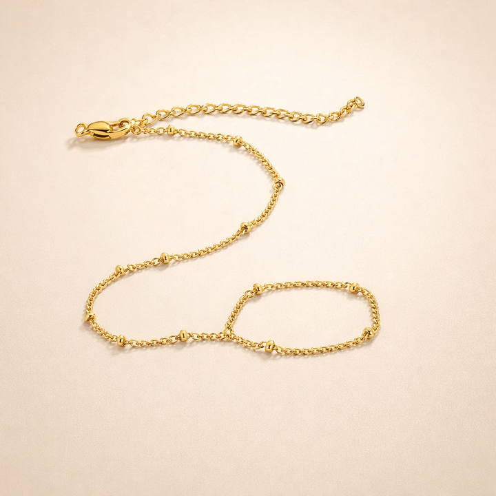 Elegante gouden armband met verfijnde details