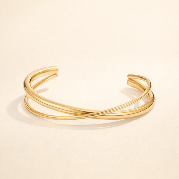 Elegante gouden armband met een verfijnde twist