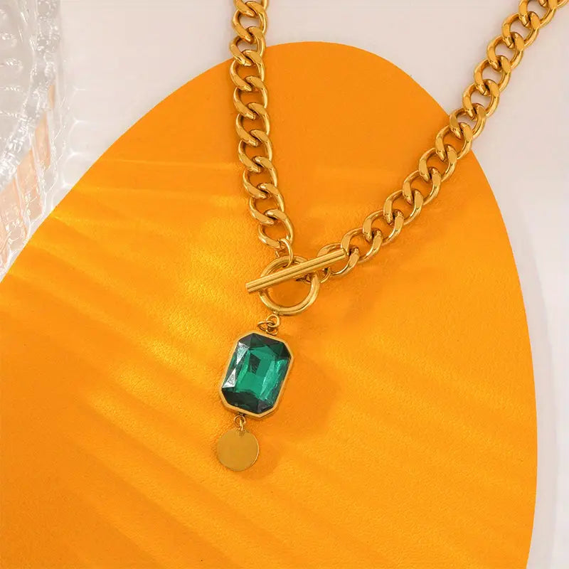 Elegante gouden ketting met smaragd hanger