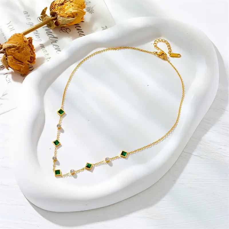 Elegante gouden ketting met subtiele bloem