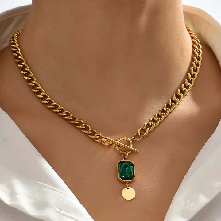 Elegante gouden ketting met smaragd hanger