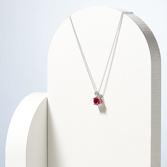 Elegante ronde robijn ketting in wit goud