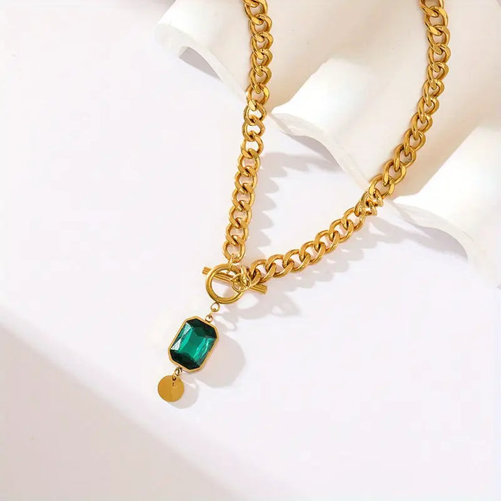 Elegante gouden ketting met smaragd hanger