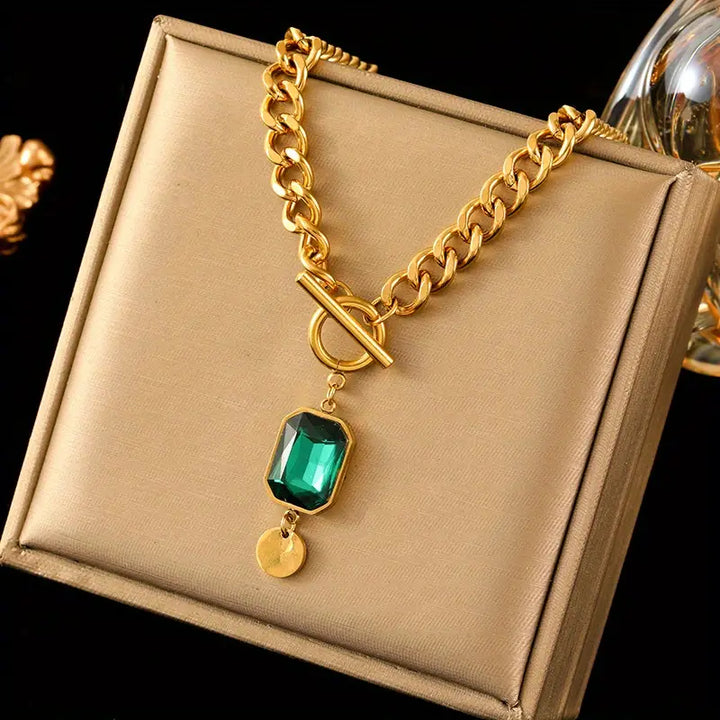 Elegante gouden ketting met smaragd hanger