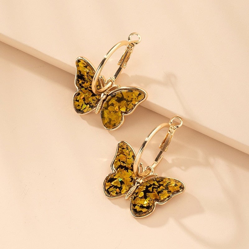 Elegante zilveren oorbellen met kristalvlinder