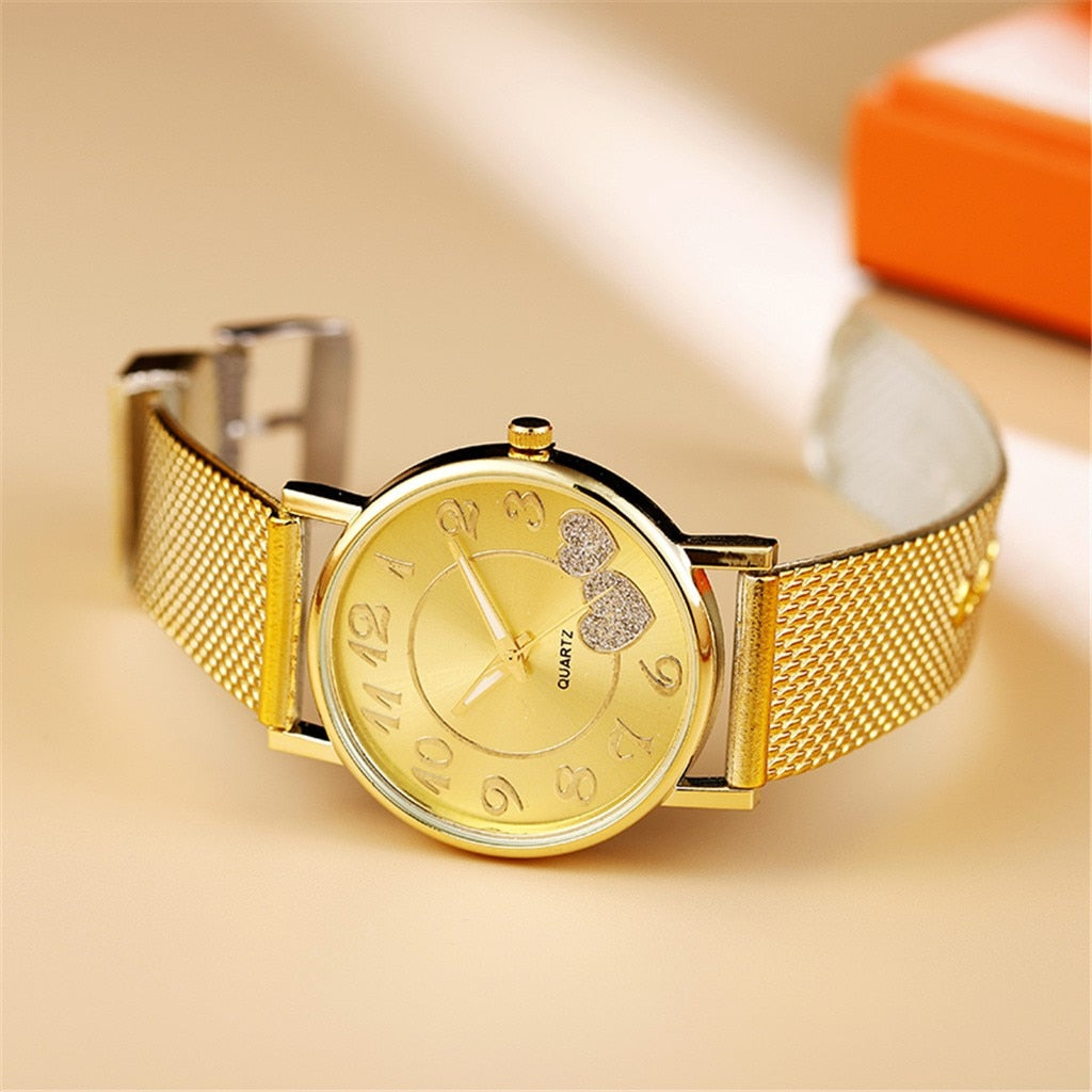 Minimalistische roségouden horloge met subtiele parel