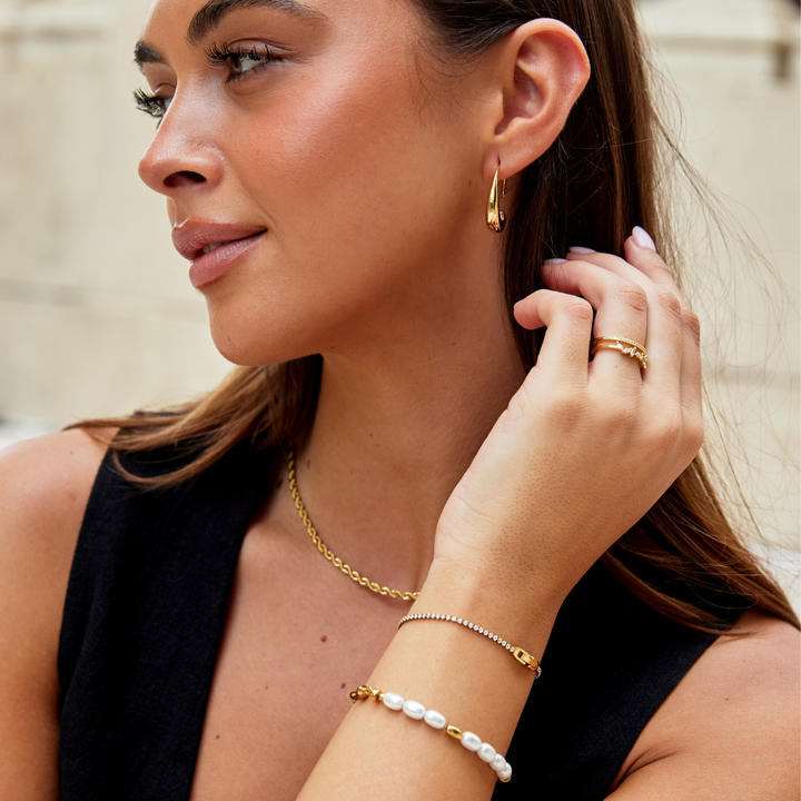 Elegante gouden armband met sprankelende kristallen