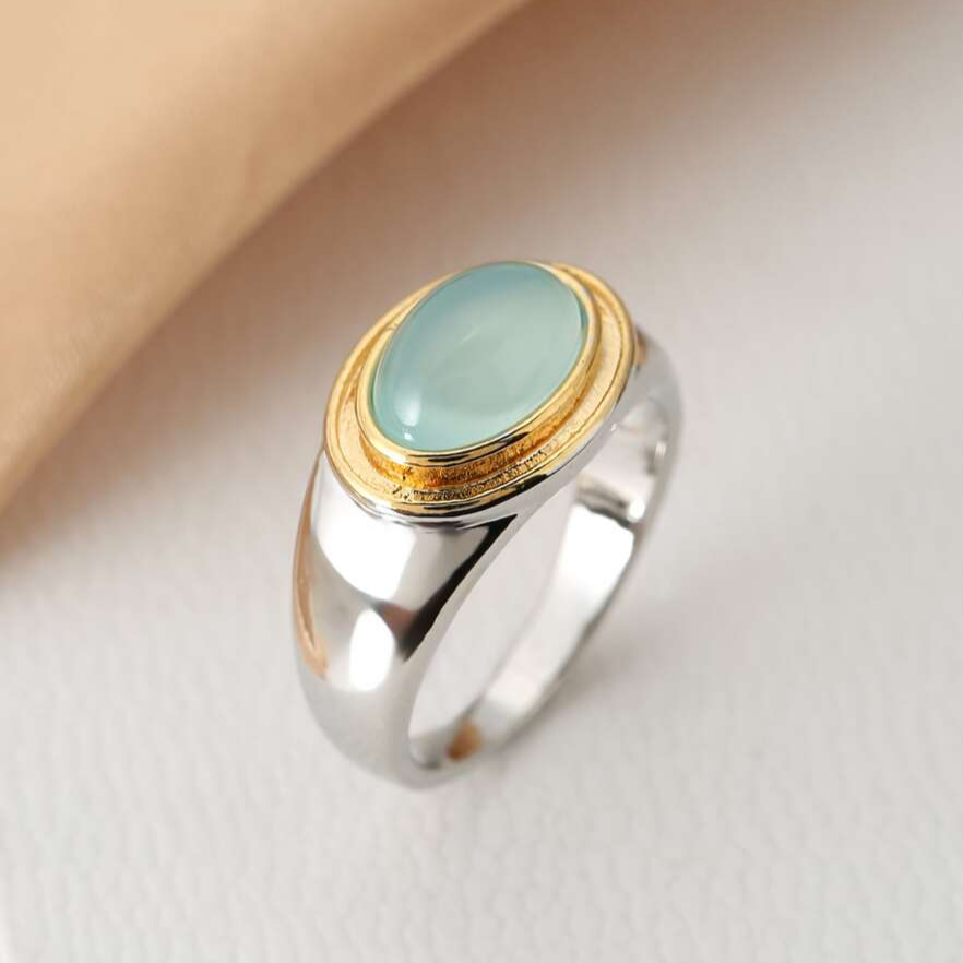 Elegante groene maansteenring in verguld zilver