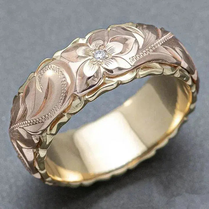 Romantische gouden ring met rozenbloemdesign
