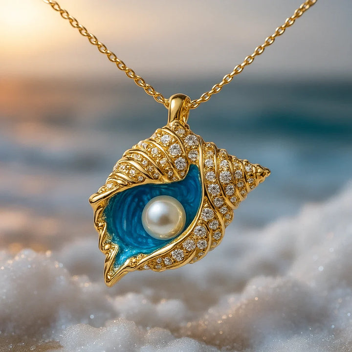 Gouden ketting met stralende parel en schelpdesign