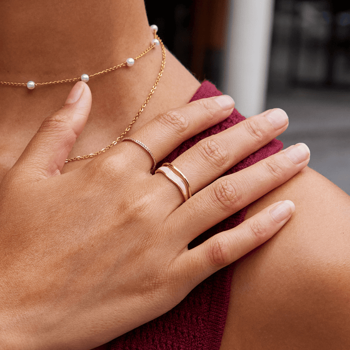 Verfijnde roségouden ring met subtiele lagen
