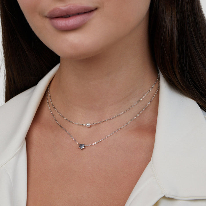 Verfijnde zilveren ketting met sterren en parels