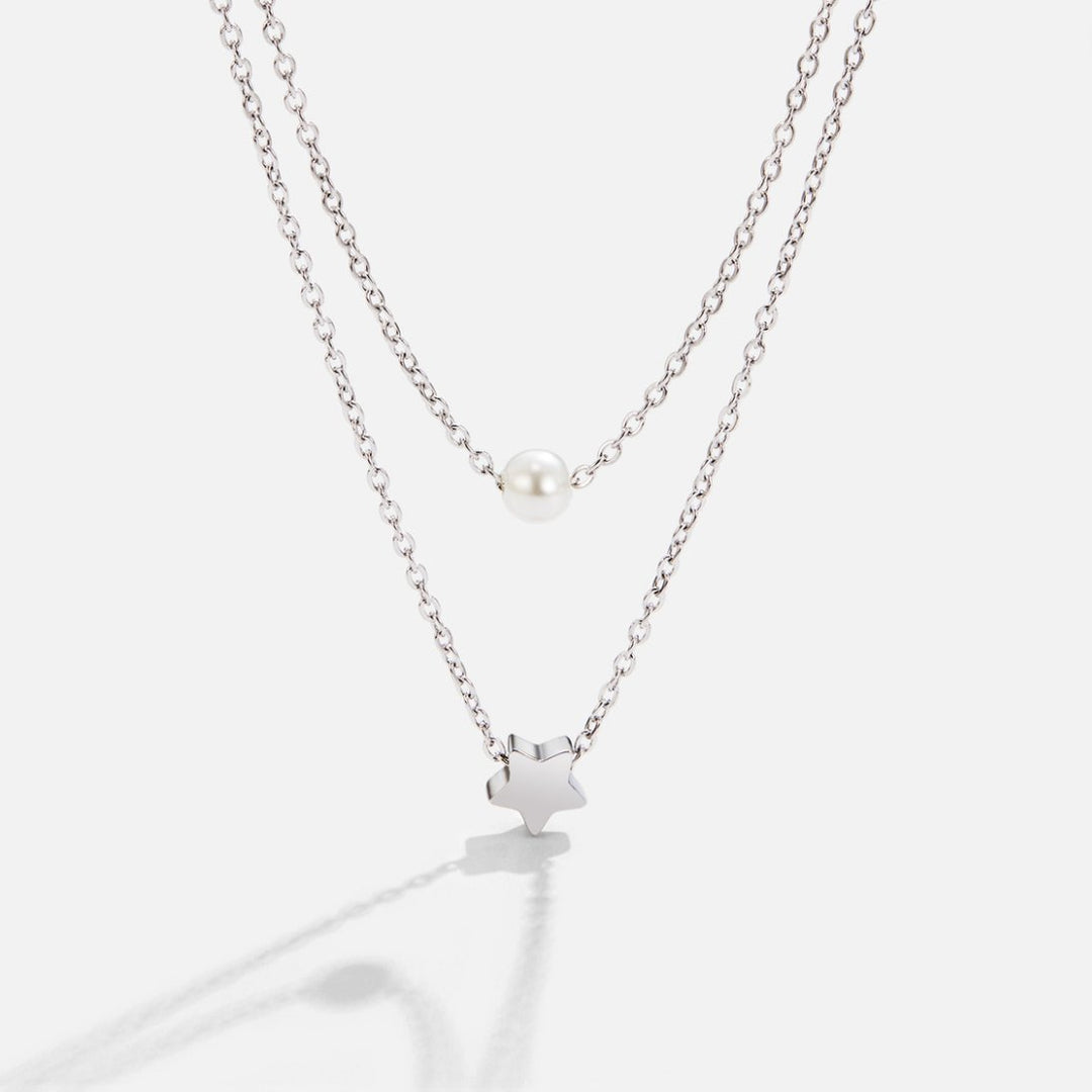 Verfijnde zilveren ketting met sterren en parels