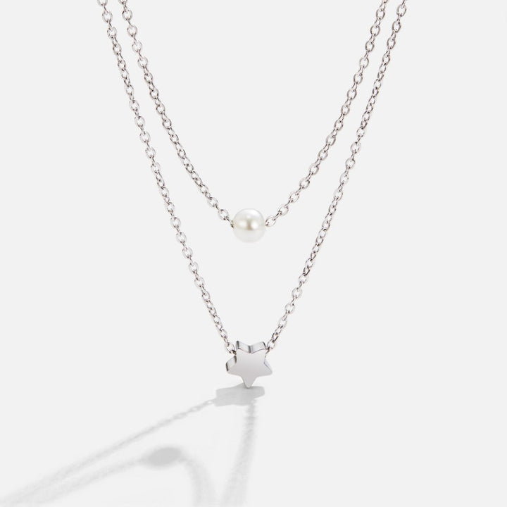 Verfijnde zilveren ketting met sterren en parels