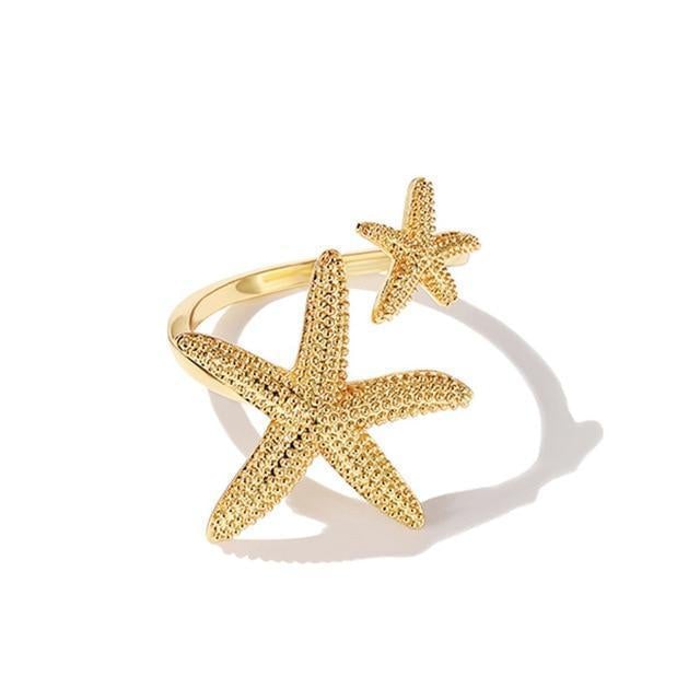 Elegante zeester ring in zilver met gouden accenten