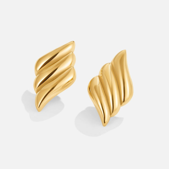 Elegante gouden oorbellen met verfijnde ronde vormen