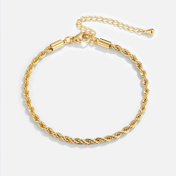 Elegante gouden armband met verfijnde draaiing